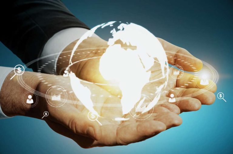 Businessman holding globe representing the transfer pricing updates included in federal budget 2025