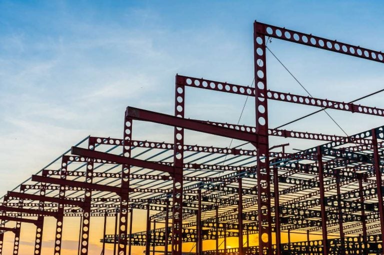 Industrial buildings under construction representing the new immediate expensing rules for manufacturers and other Canadian business tax changes 2026