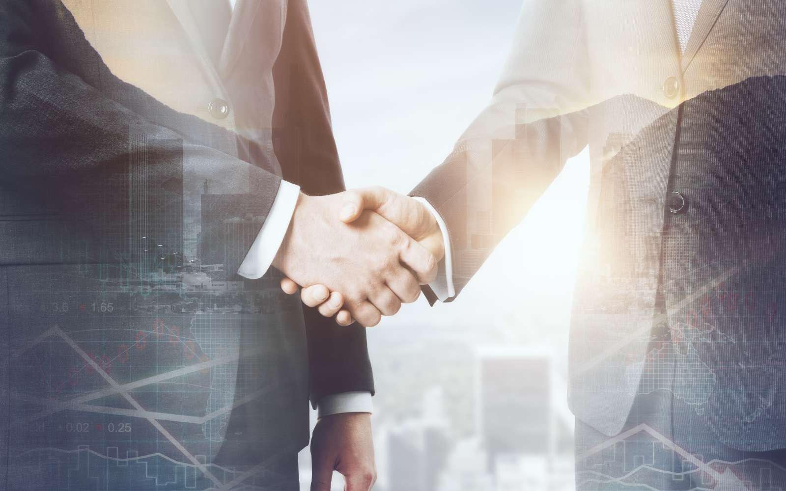 NVS M&A Tax Planning Tips for Canadian Business Leaders Blog Header Image showing businessmen shaking hands